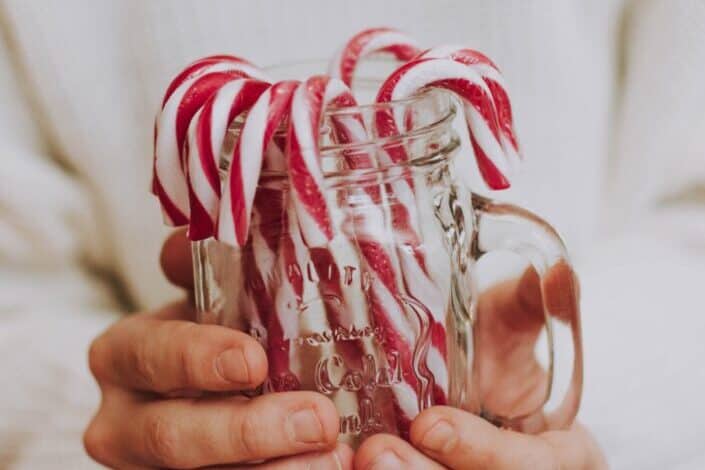 candy canes inside a jar