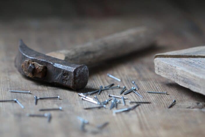 nails and hammer on wood