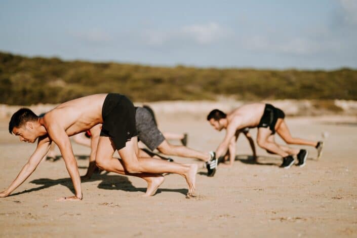 men starting an obstacle course