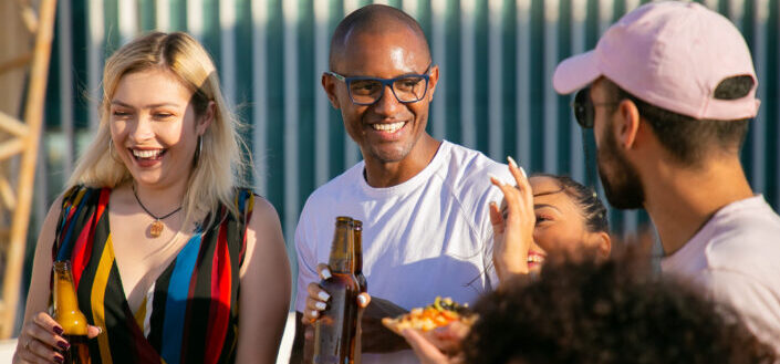 group of people drinking having fun outdoors