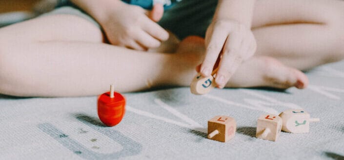 Boy holding dreidel
