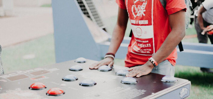 man with hands on a game table
