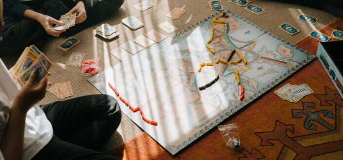 two friends playing a board game