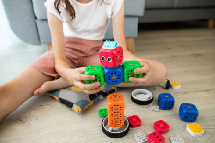 Woman playing with cubes