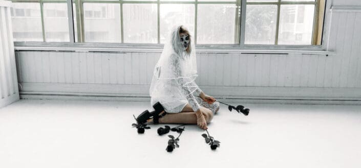Do it yourself creative Halloween costume or make up for the ghost player.
