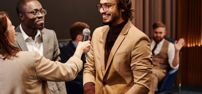 Man in suit Smiling at an Interview