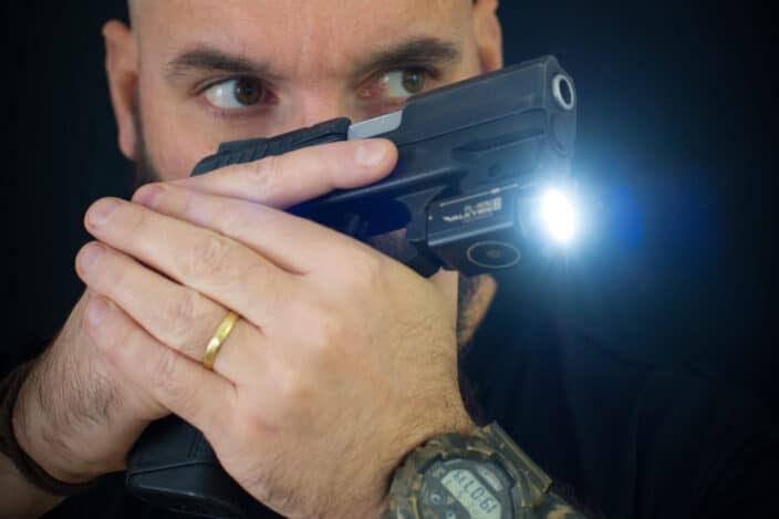 Man Aiming His Gun