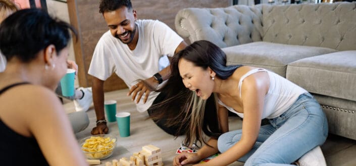 Friends Playing Jenga