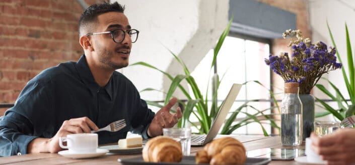 Man in a Business Meeting in a Cafe