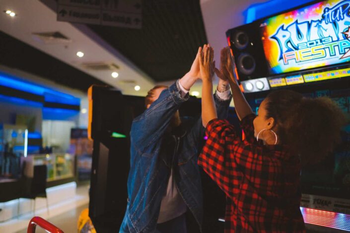 Couple Playing in The Arcade