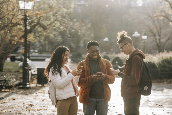 Male and Female Students Using Smartphones