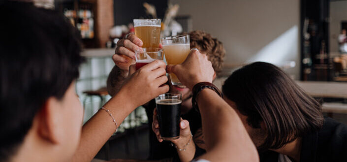 People Raising Their Glasses